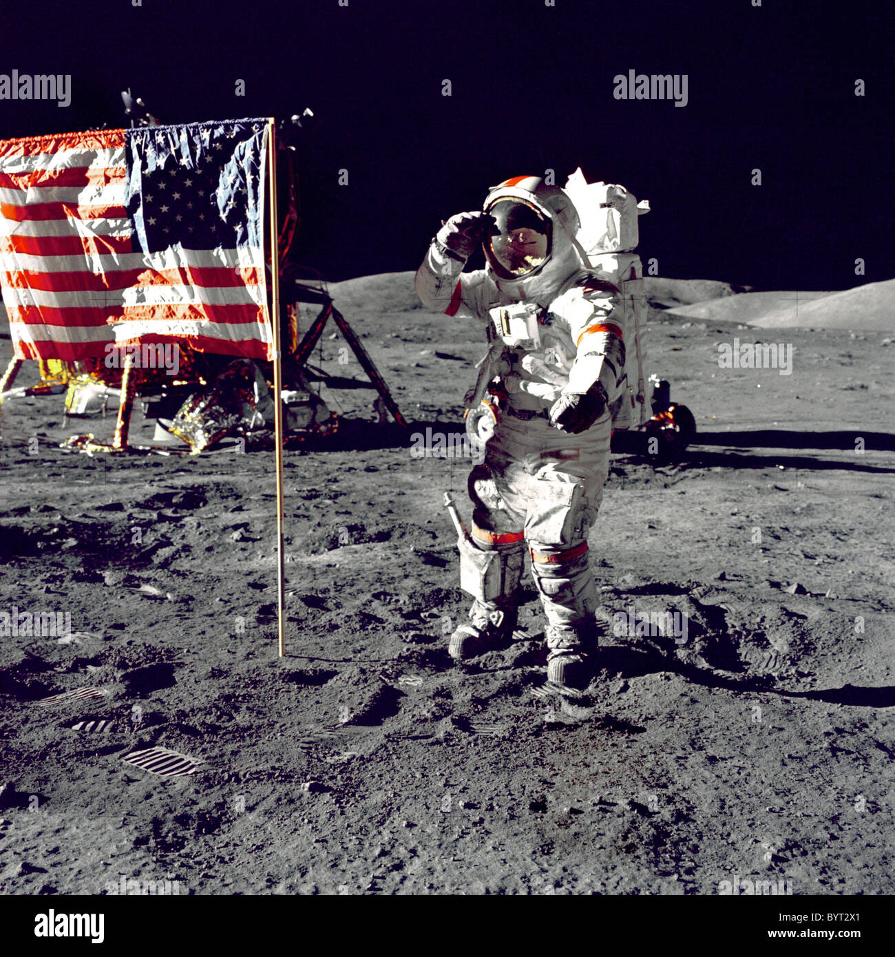 Apollo 17 astronaut Eugene A. Cernan salutes the U.S. flag during the moon landing. Stock Photo