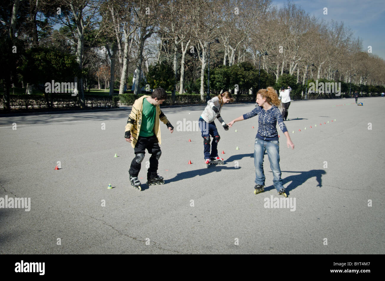 Roller bladders practicing, Retiro Park, Madrid, Spain Stock Photo