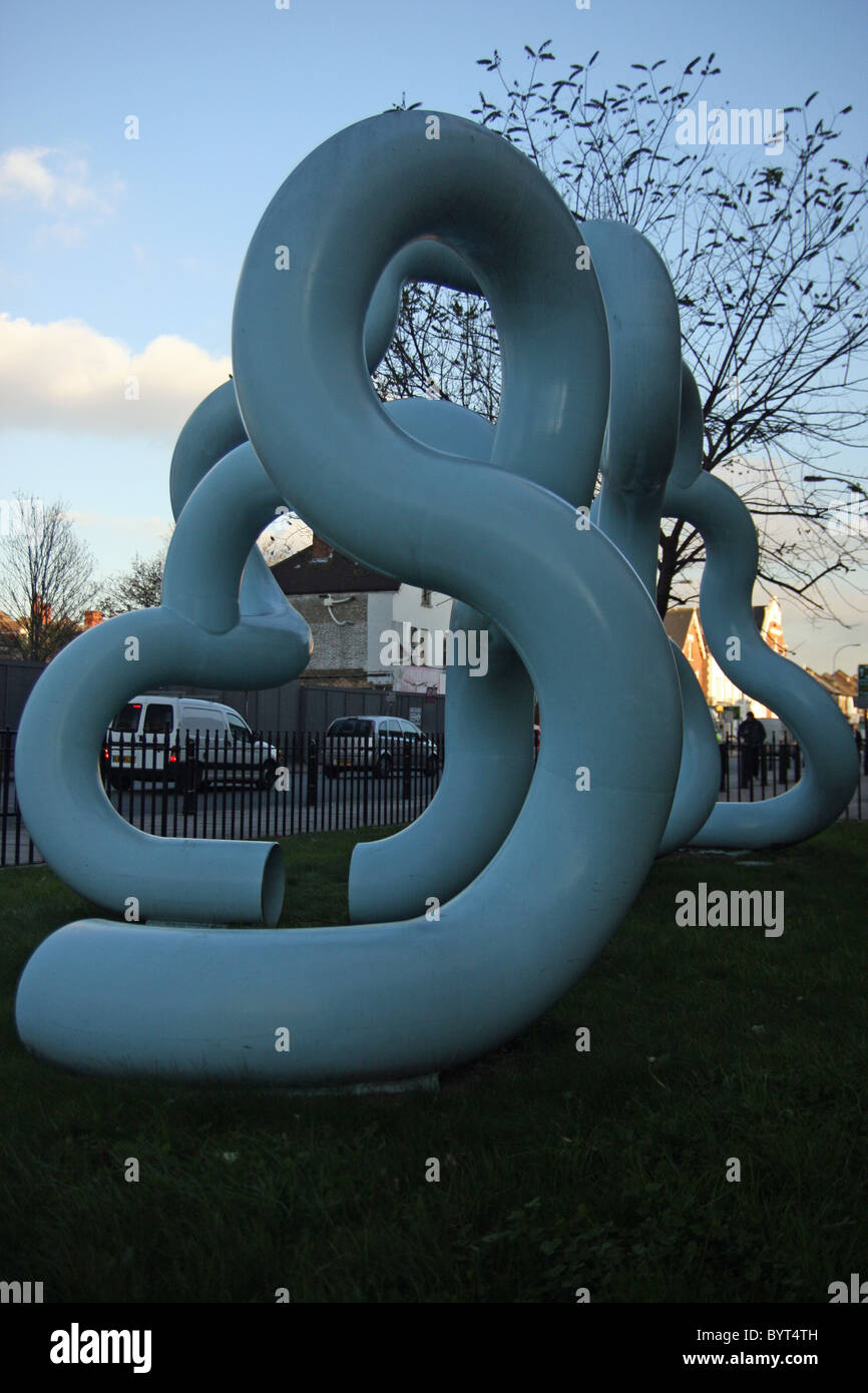 Waterline, a tubular blue steel sculpture by artist Oliver Barratt in Catford, London Stock