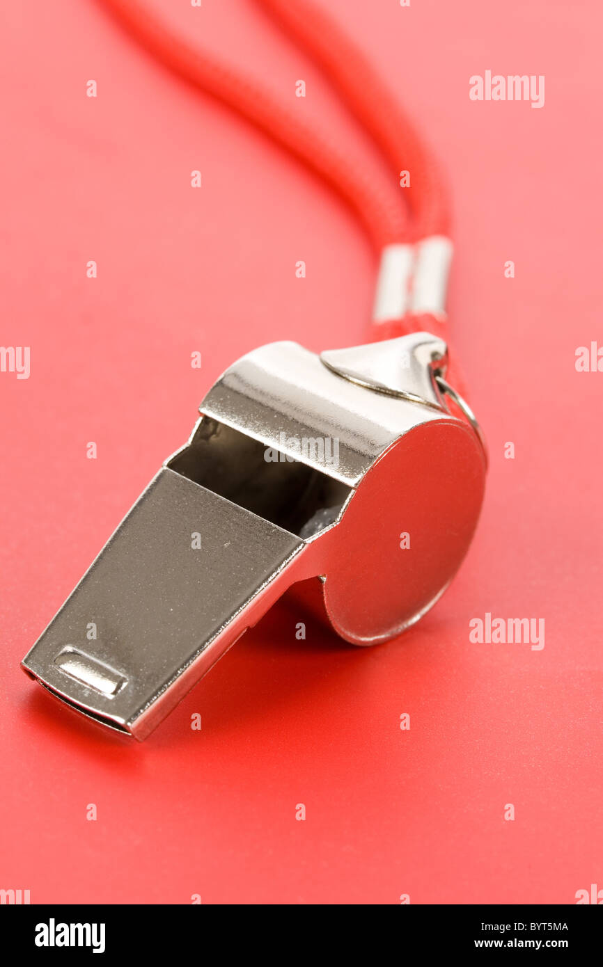 a whistle with red background Stock Photo Alamy