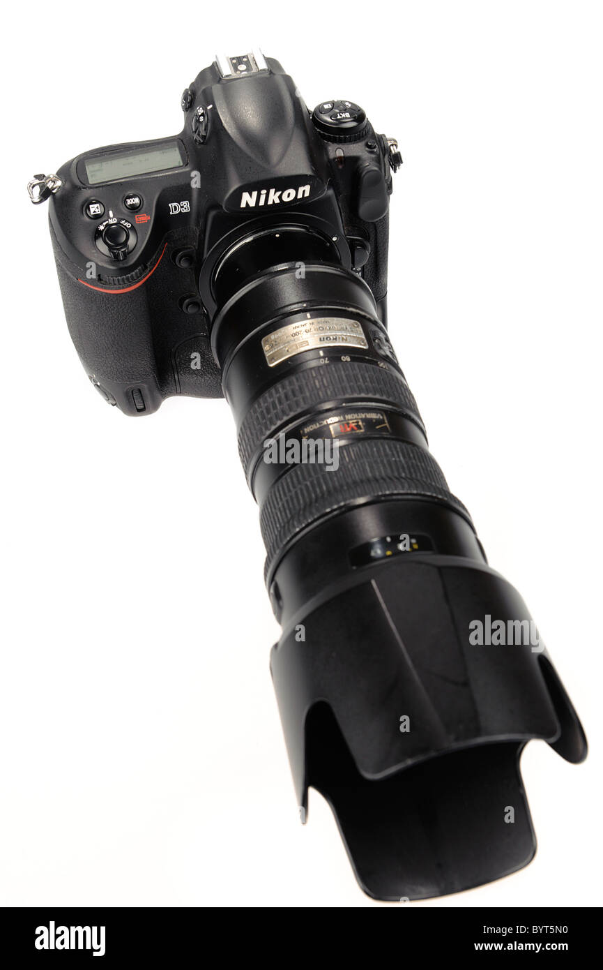 High angle view of a Nikon D3 full frame digital camera DSLR with Nikkor 70-200mm 2.8 VR lens cutout on white background Stock Photo