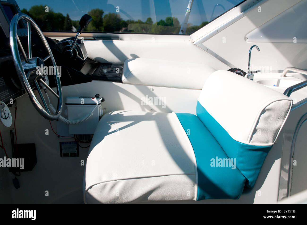 Boat interior showing driver's seat Stock Photo Alamy