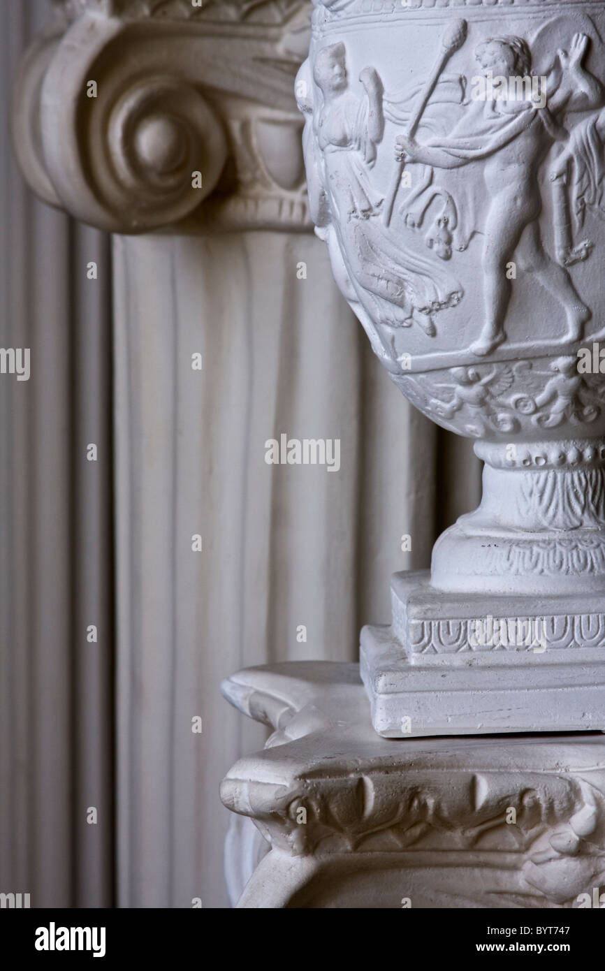 Detail of stone carving on lamp with columns on backgound and copy space Stock Photo