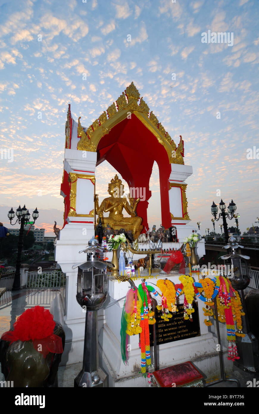 A Buddha shrine at the night market in Phitsanulok, Thailand Stock Photo