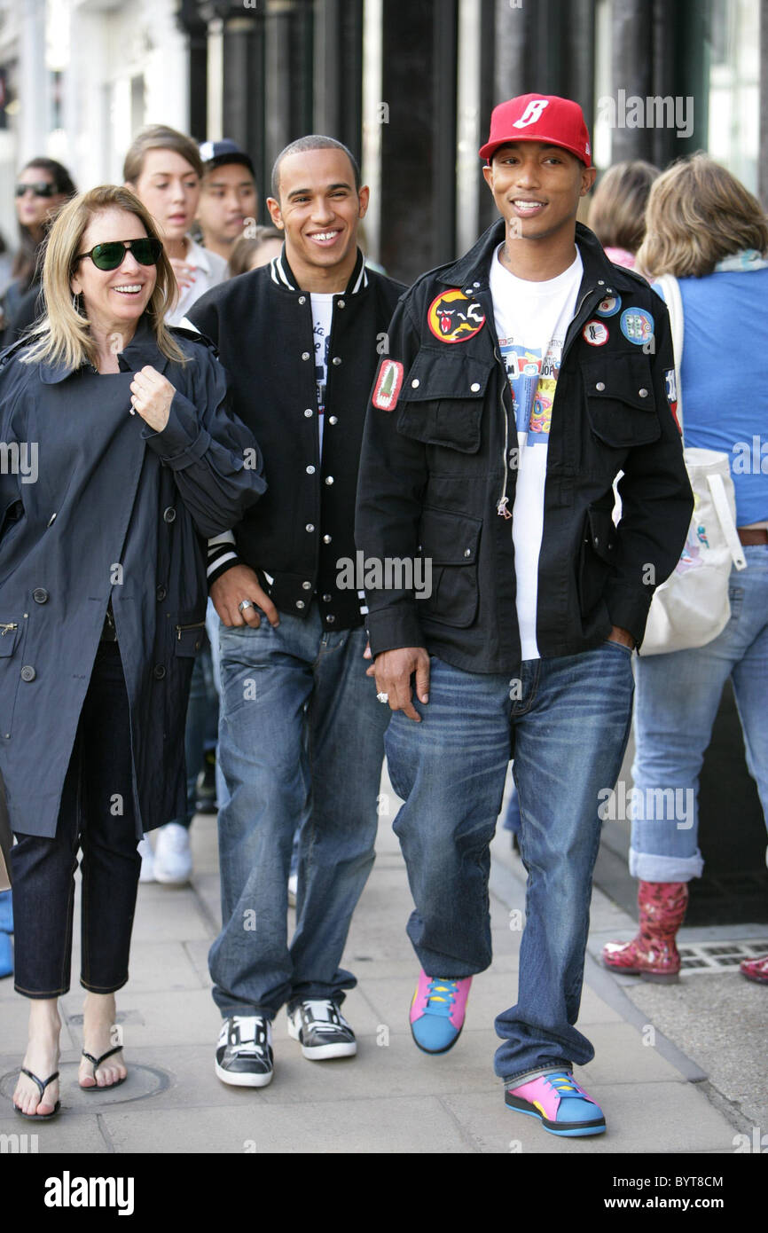 Lewis Hamilton and Pharrell Williams the two new friends out shopping  together, checking out the bling on Bond Street. London Stock Photo - Alamy