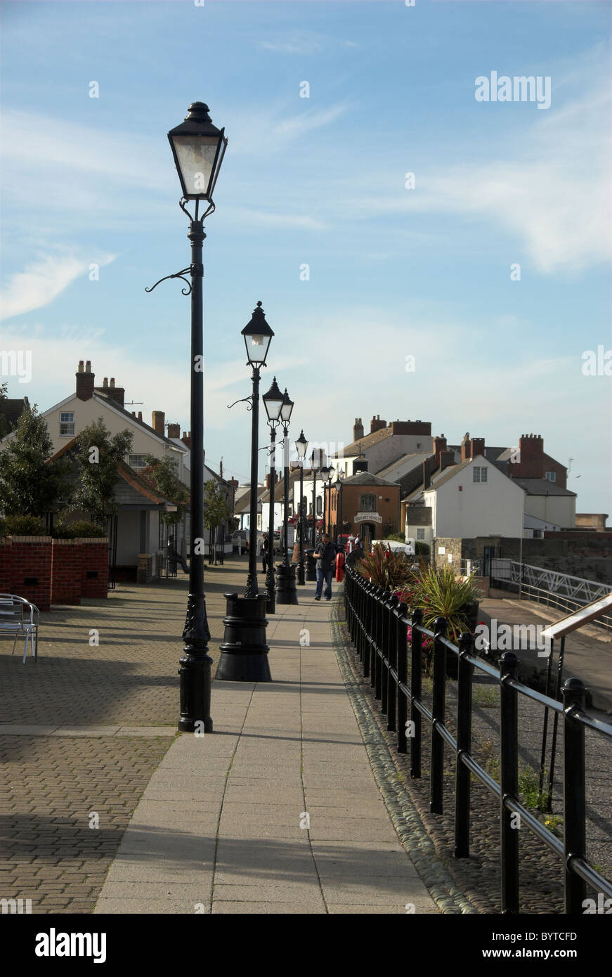 A row of old fashioned lamp posts at the seaside town of Watchet, Somerset, UK September 2009 Stock Photo