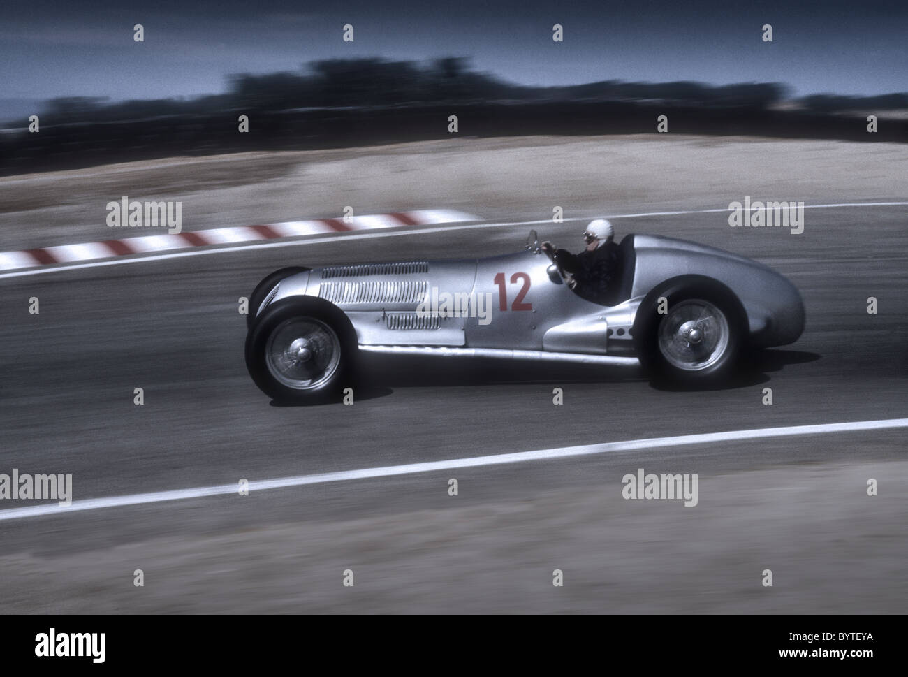herman-lang-at-the-wheel-of-1937-w125-mercedes-gp-car-at-monterey-BYTEYA.jpg