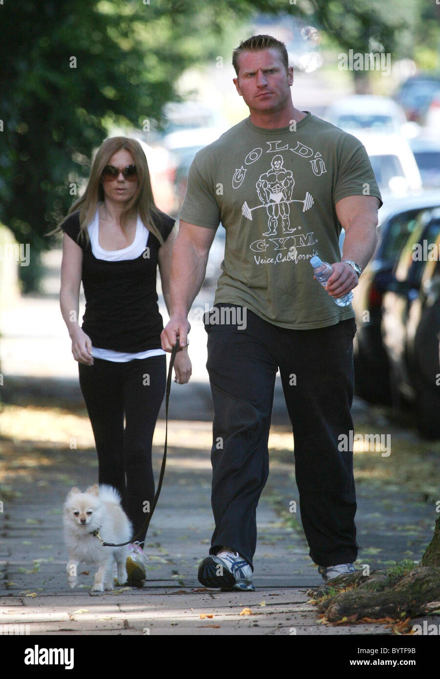 Geri Halliwell and her personal fitness instructor Tim Blakeley leave Geri's house to go for a jog with her dog 'daddy'. It was Stock Photo