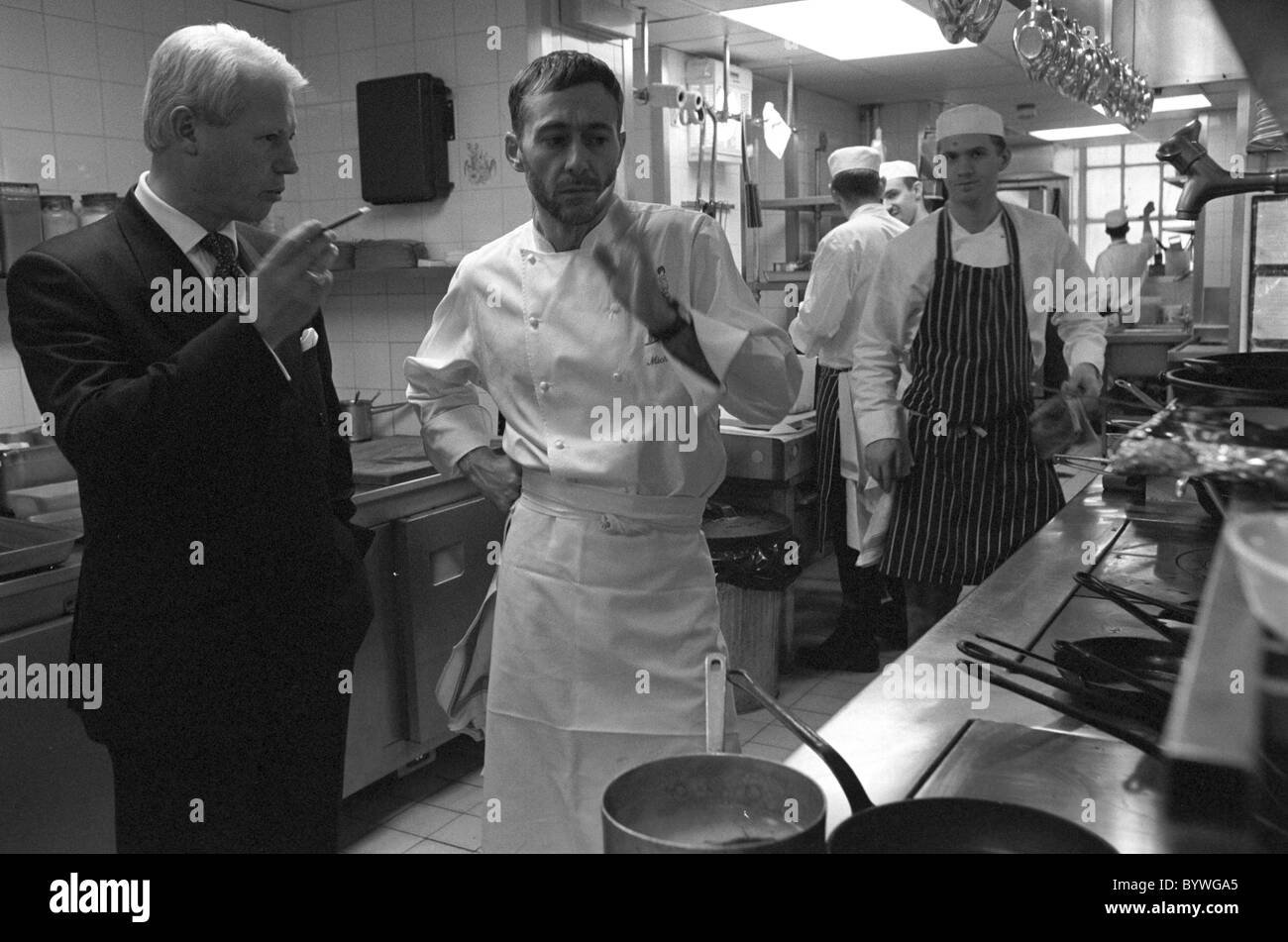 Michel Roux jr at Le Gavroche discussing the menu with Silvano Giraldin Stock Photo