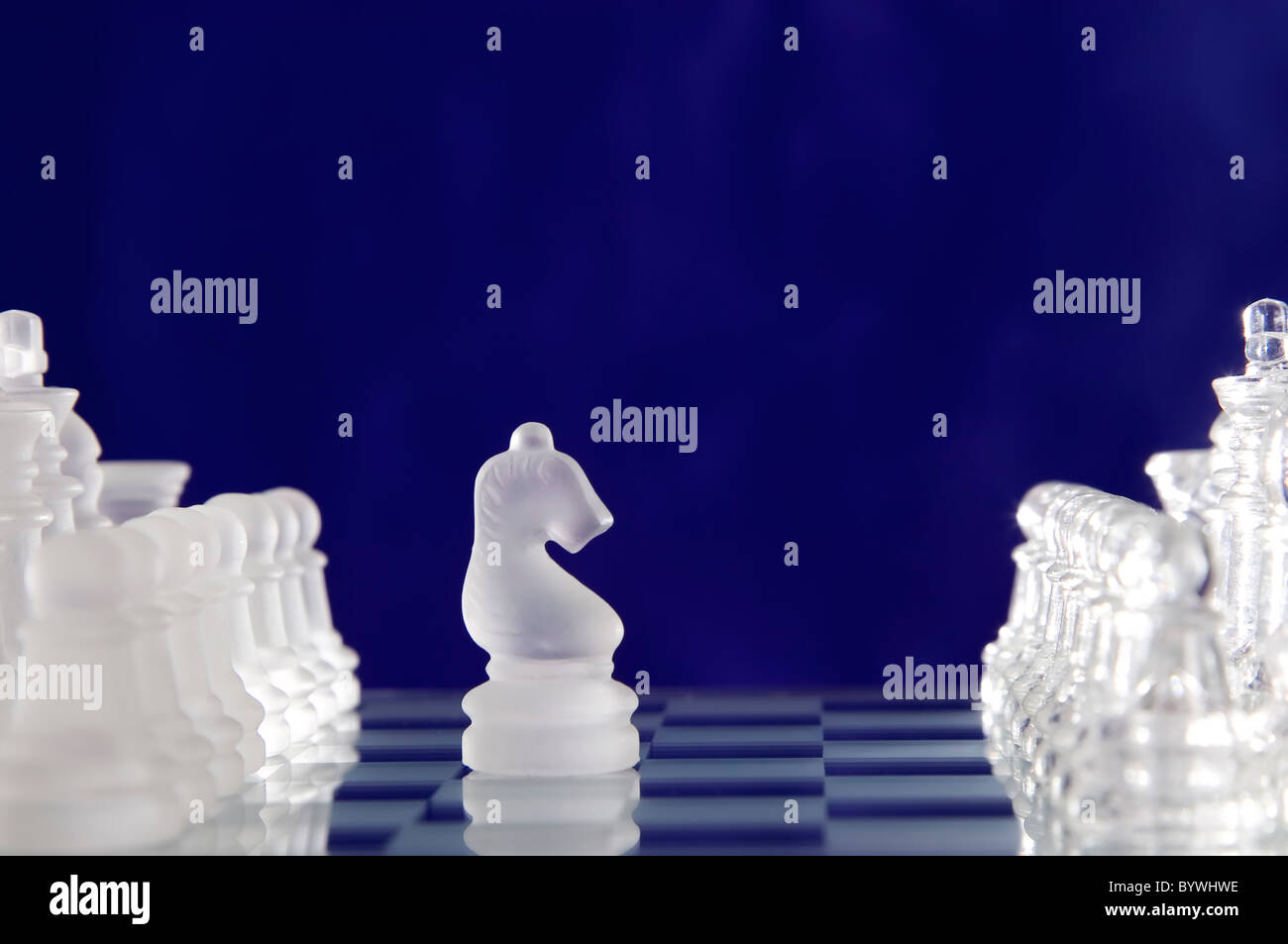 Game for leisure chess with figures on blue background Stock Photo