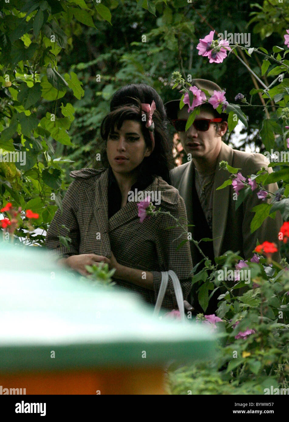 Amy Winehouse leaving her house in a cab with her husband Blake Fielder