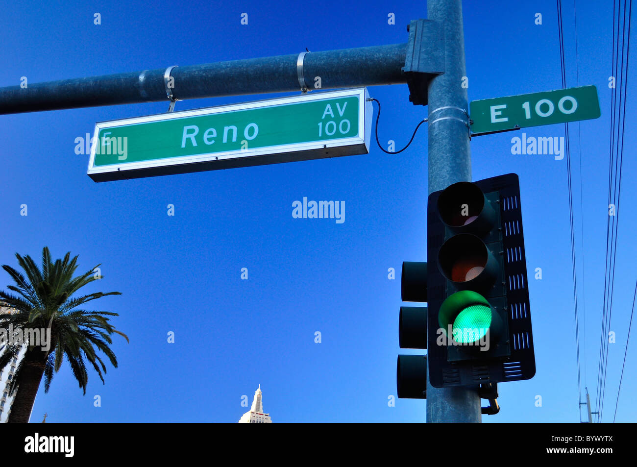 Green traffic light and Reno Avenue sign in Las Vegas Stock Photo