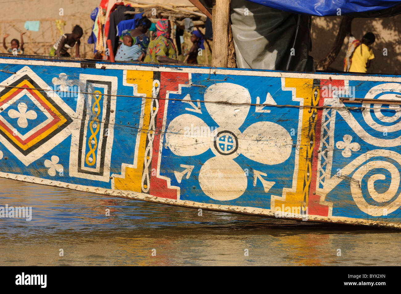 Colourful traditional design on the side of a pinasse. Mali Stock Photo