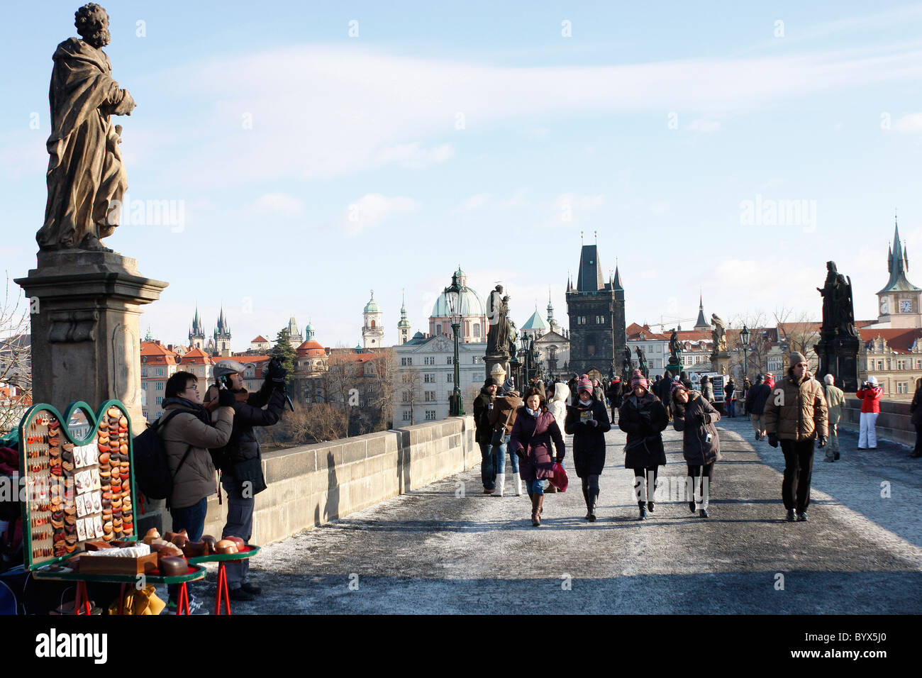 The historic Charles Bridge over the Vitava River,Prague,busy with artists and tourists throughout the year. Stock Photo