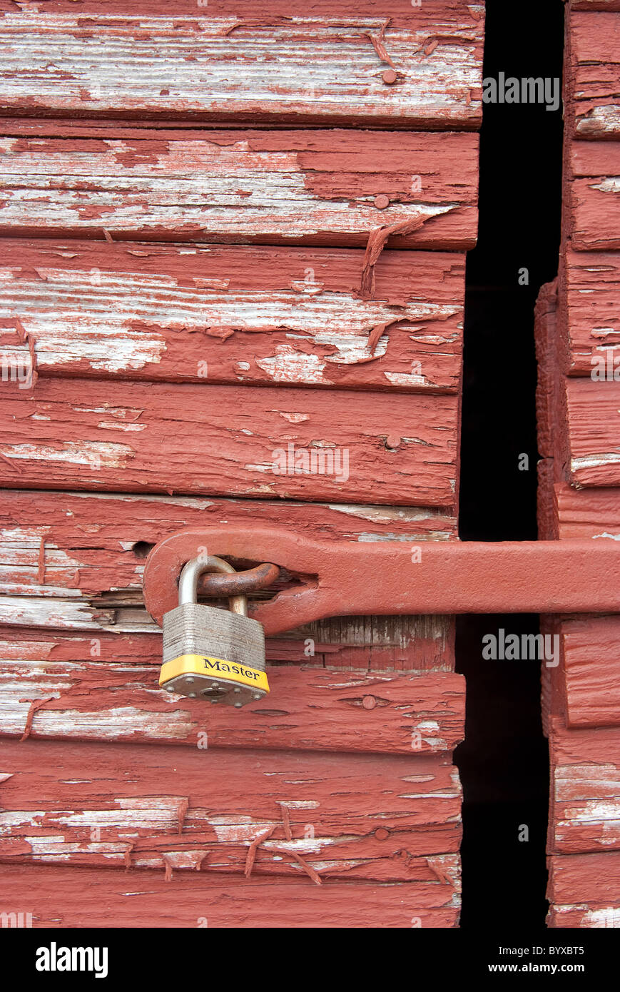 Red barn door, close ups showing texture. Stock Photo