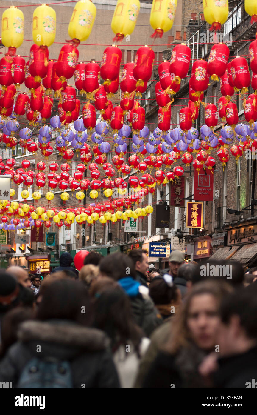 Hanging Chinese lanterns and crowds during the Chinese New year