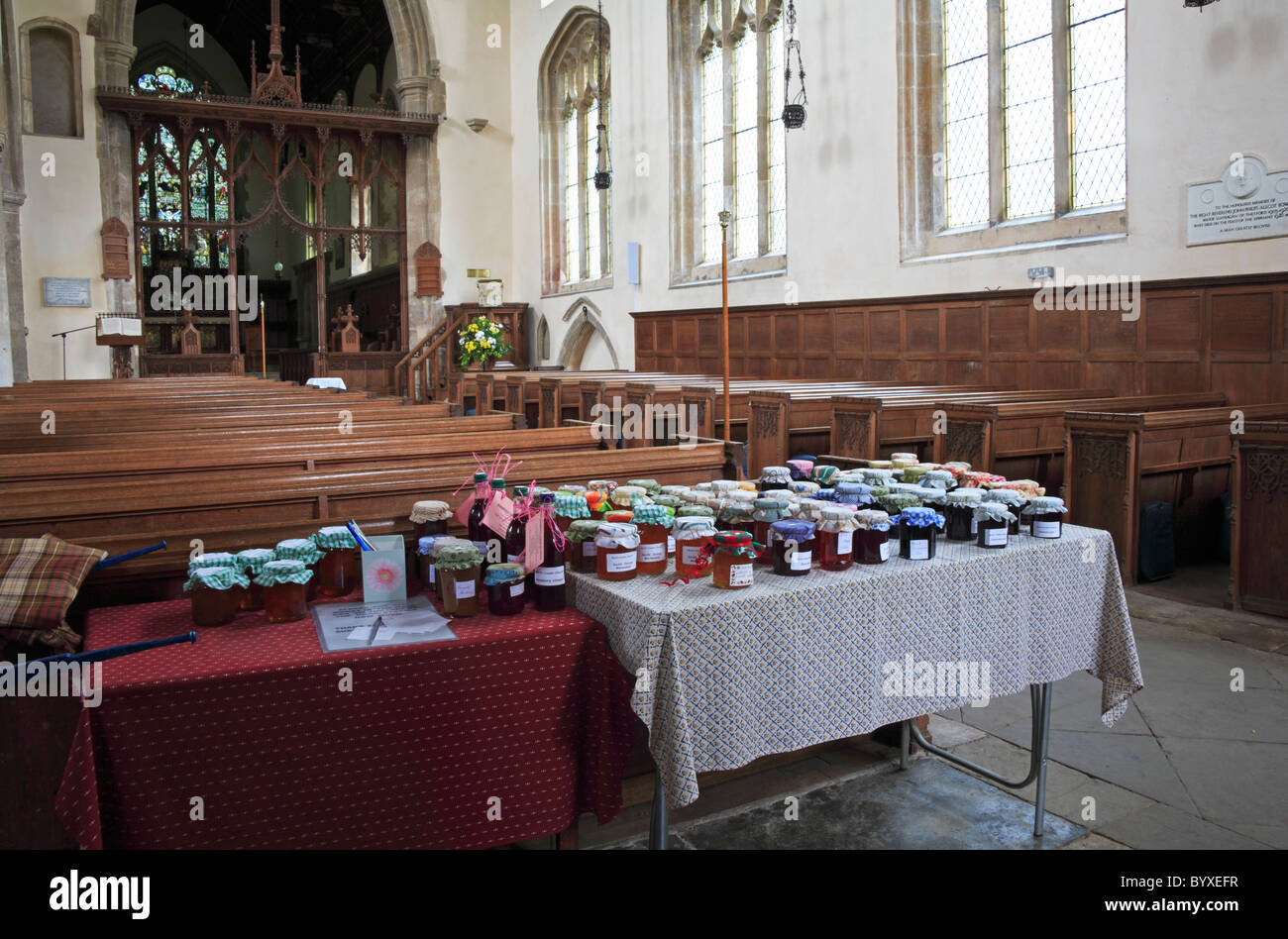 A stall of home produce for sale in the Church of St Mary the Virgin at North Creake, Norfolk, England, United kingdom. Stock Photo