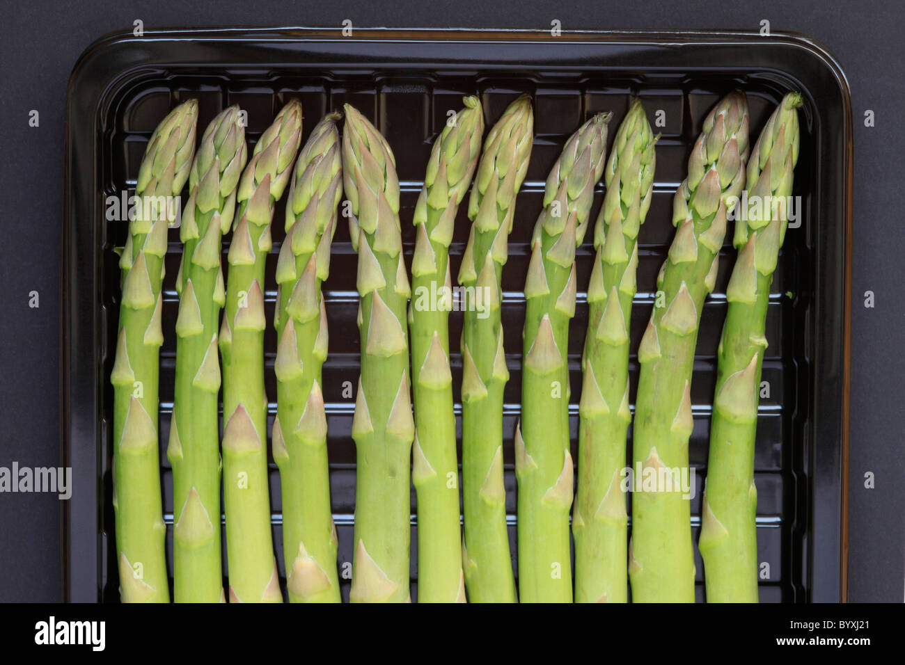 Asparagus tips in packaging Stock Photo Alamy