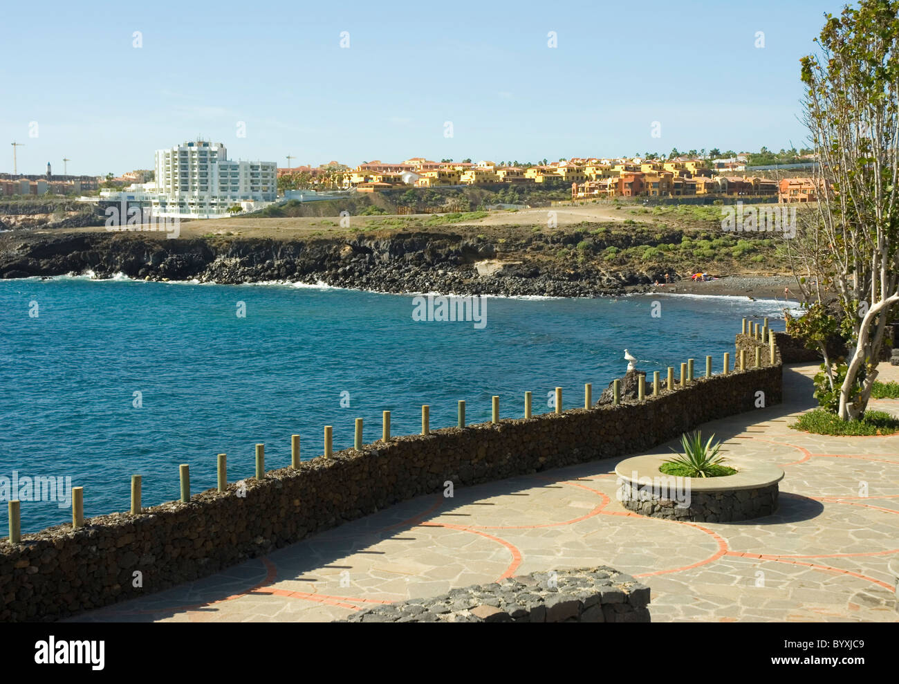 Los Abrigos, promenade above the rocky cliffs which leads down to the harbour. Stock Photo