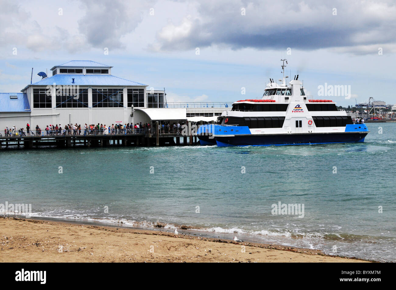 Passengers boarding a Fullers ferry boat at Devonport Ferry Terminal Auckland New Zealand Stock Photo