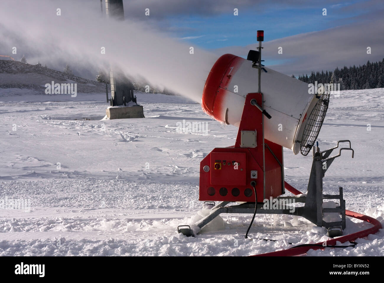 Closeup of the snow making machine in action with control pannel. Stock Photo