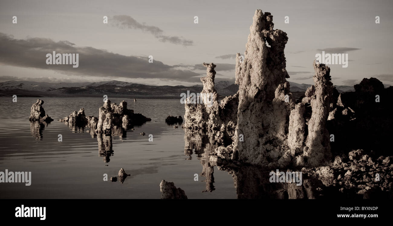 Winter sunset over Mono Lake, California highlighting tufa calcium rock formations against the calm water. Stock Photo