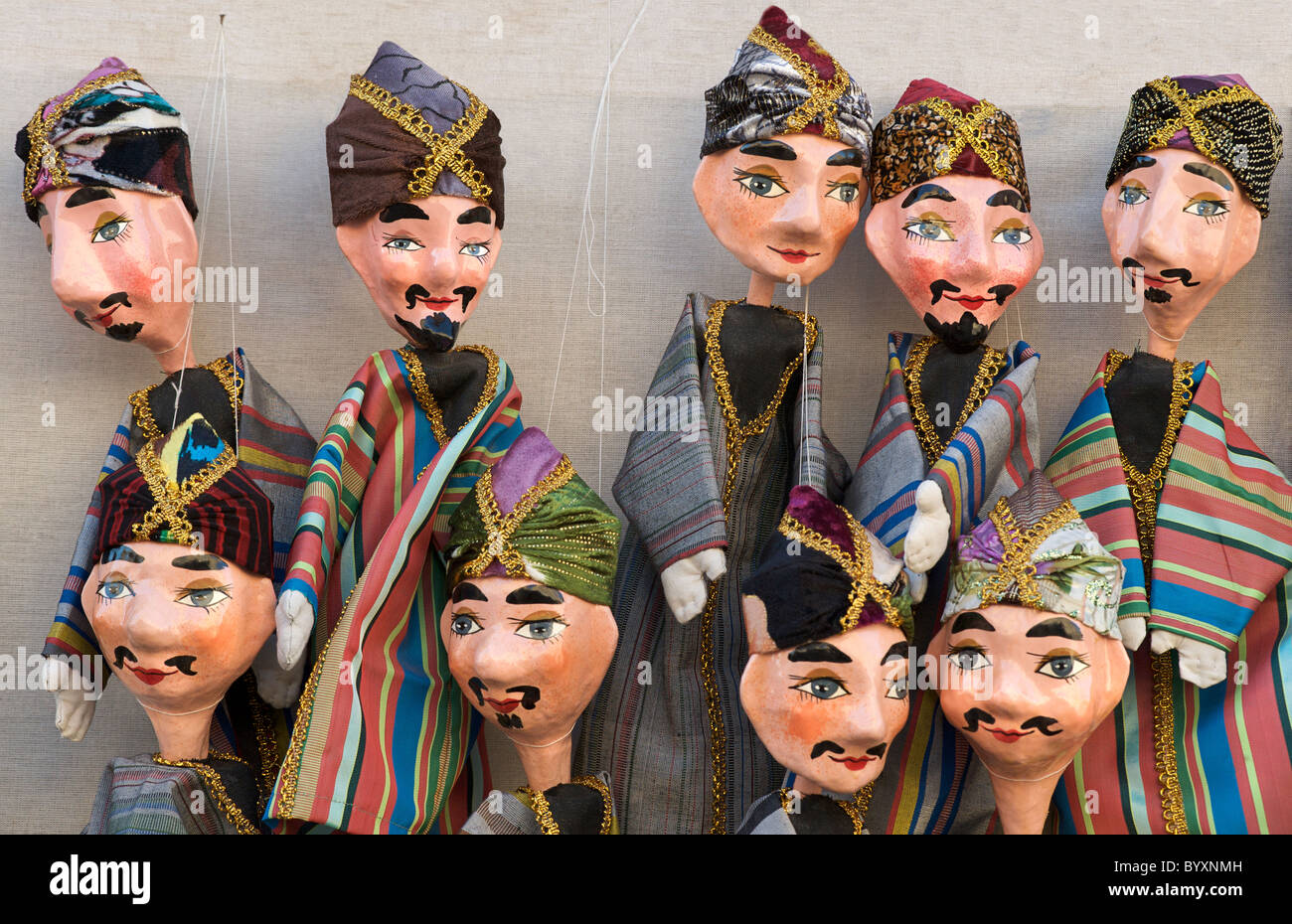Traditional handmade Uzbeki puppets for sale at market, Khiva, Uzbekistan Stock Photo