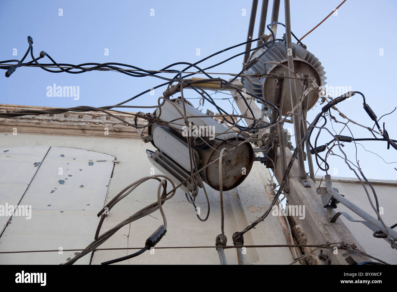damaged electrical wires and transformers after the earthquake Stock