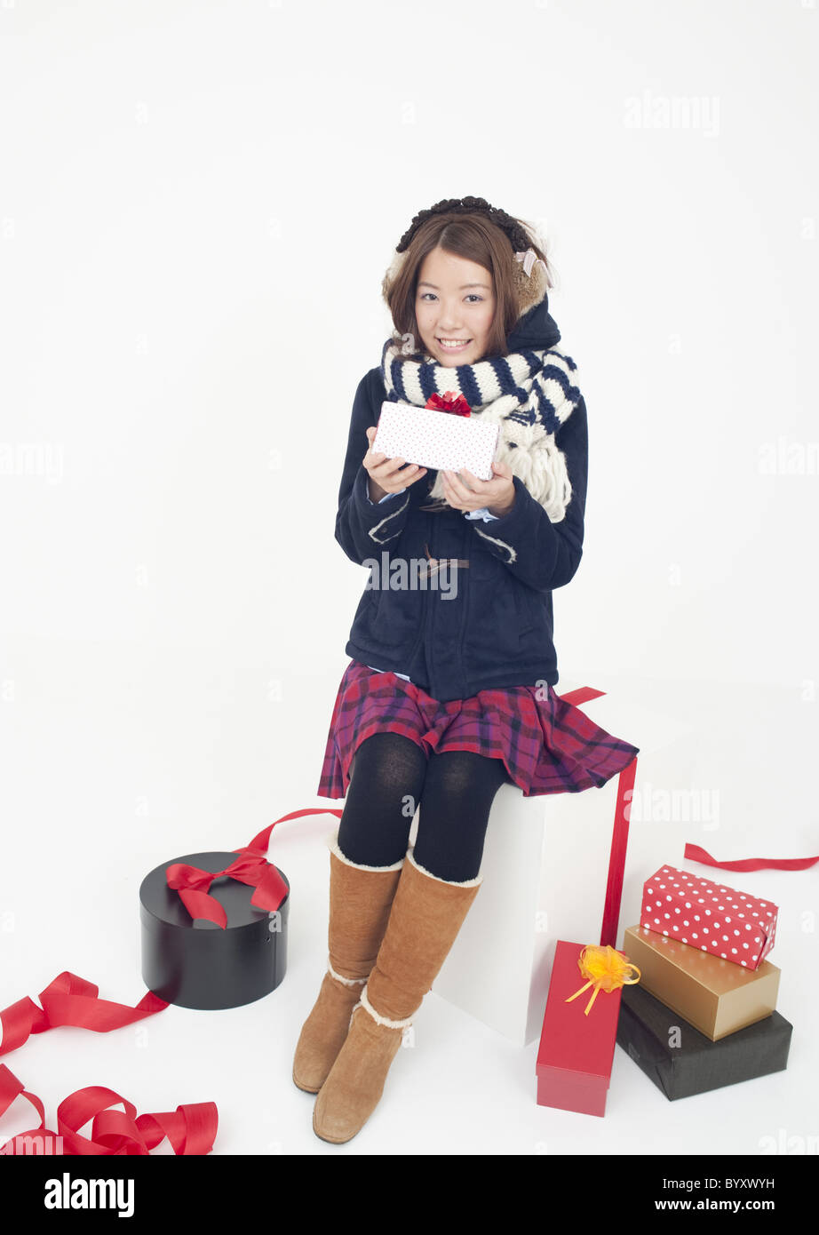 Gifts and young woman Stock Photo - Alamy