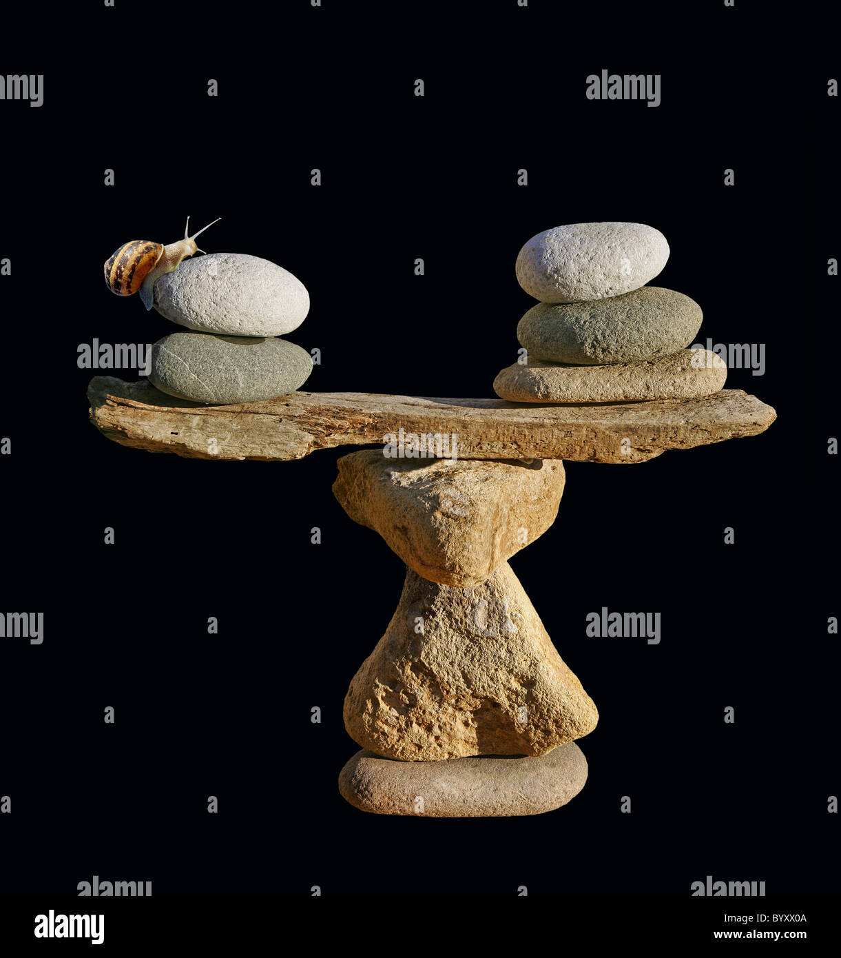 The balance of nature, abstract smiling man sculpture depicting balance with snail representing