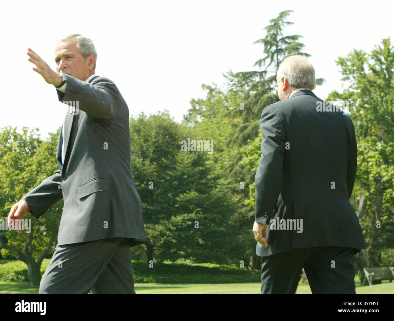 President W. Bush and Karl Rove leave to board the US Government helicopter Karl Rove