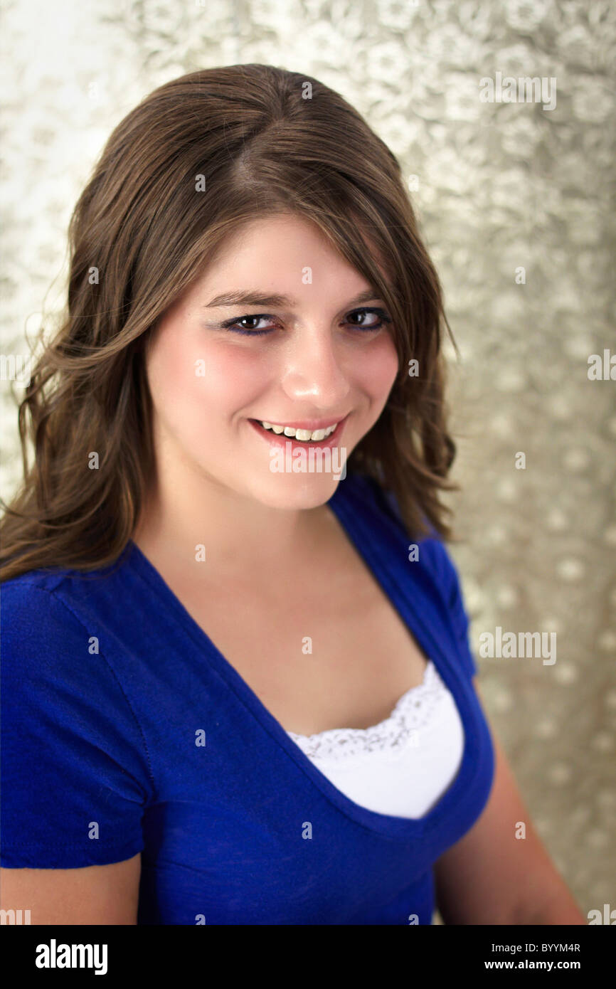 A 17 year old girl with long brown hair Stock Photo