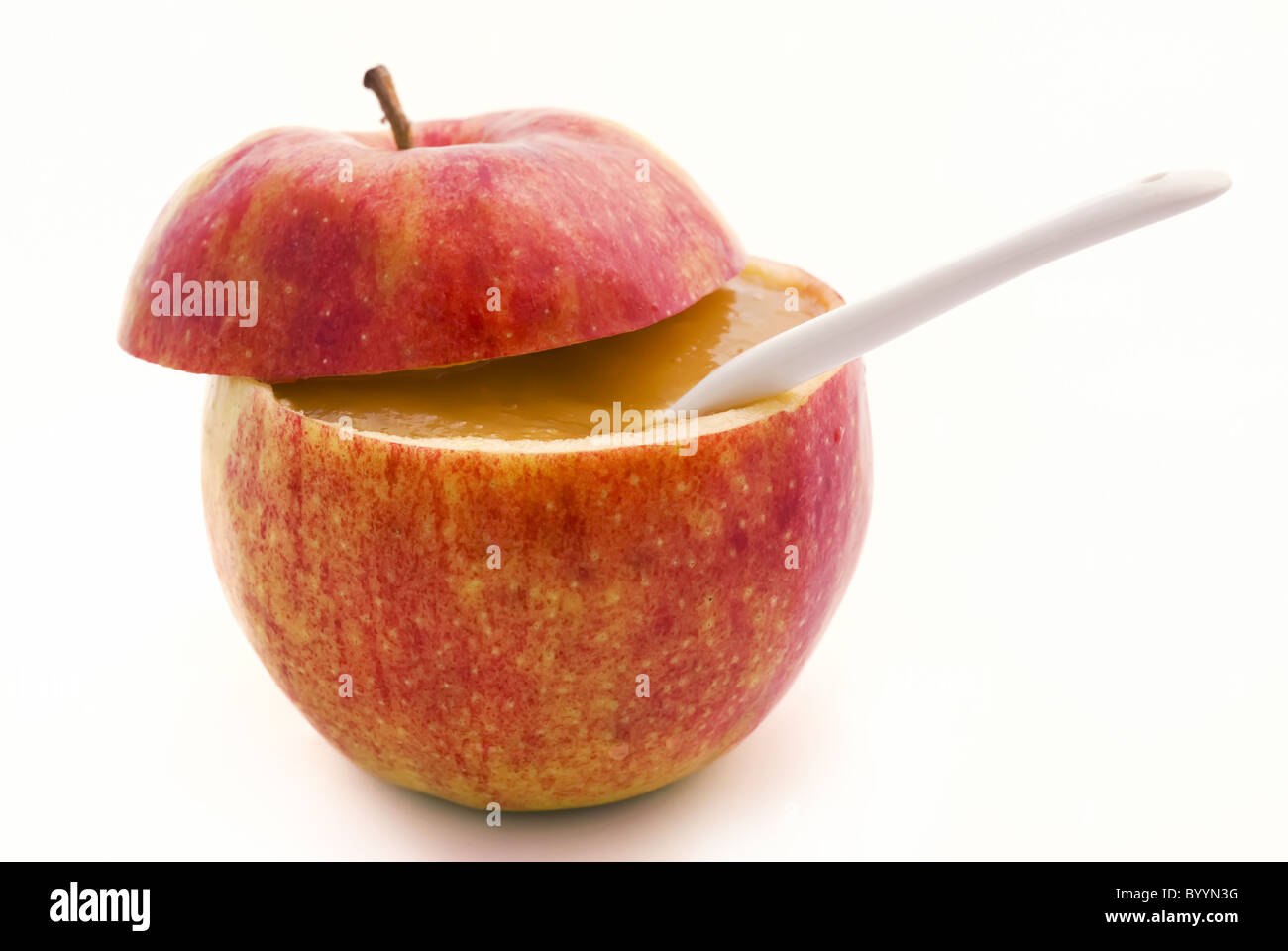 Apple compote in apple as closeup on white background Stock Photo