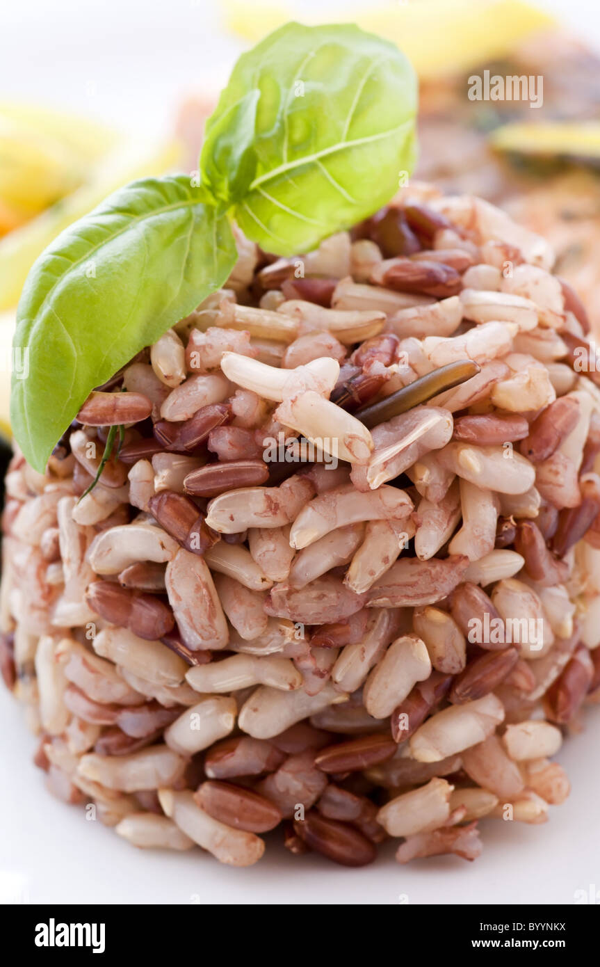 Boild Brown rice as closeup as side dish Stock Photo