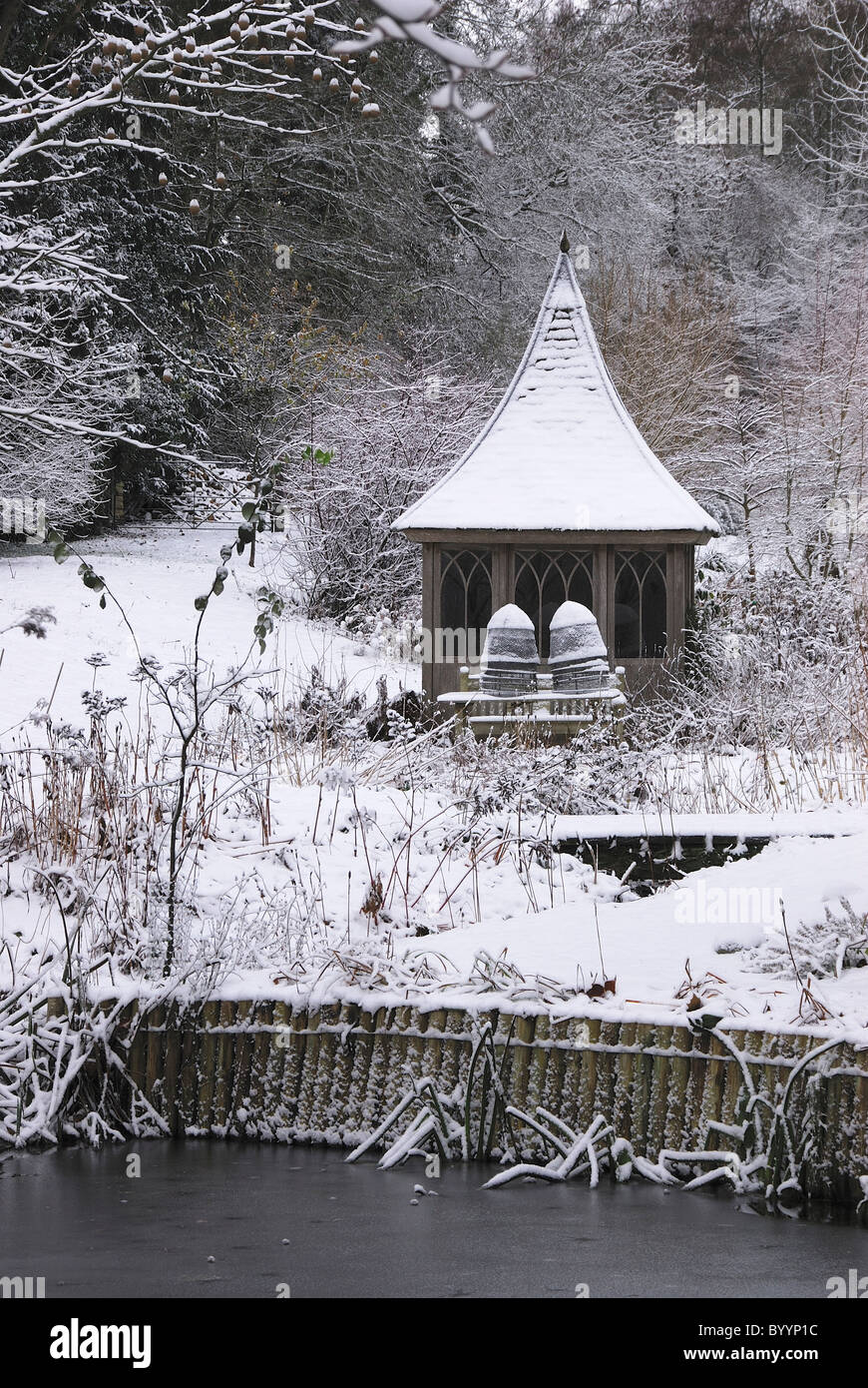 Formal garden in winter after snowfall. Dorset, UK December 2010 Stock Photo