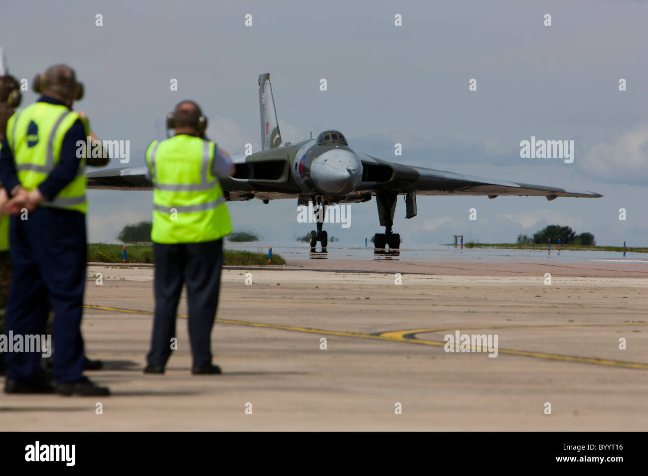 Vulcan delta wing bomber taxiing on the runway having landed at RAF Lyneham Stock Photo