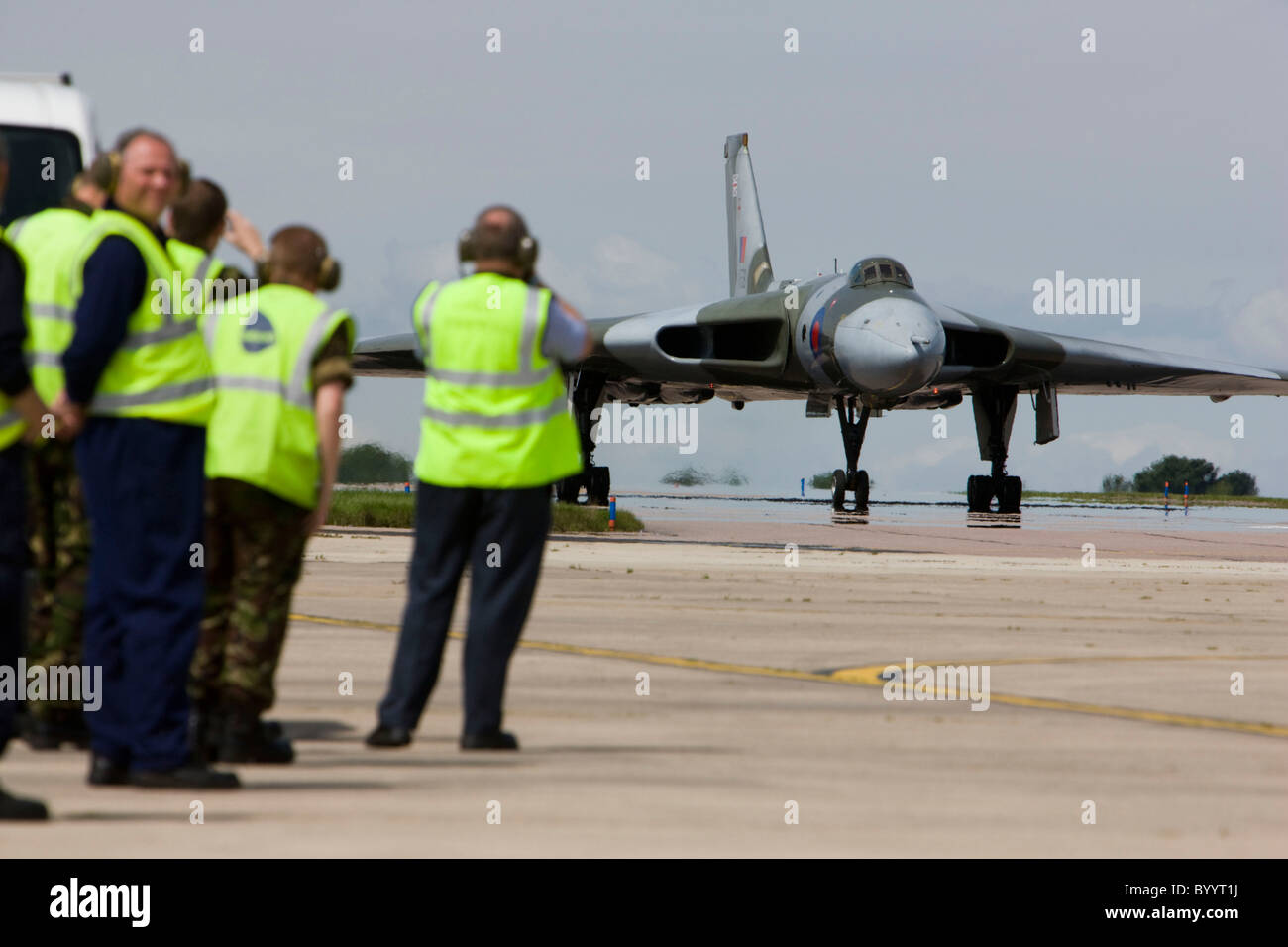 Vulcan delta wing bomber taxiing on the runway having landed at RAF Lyneham Stock Photo