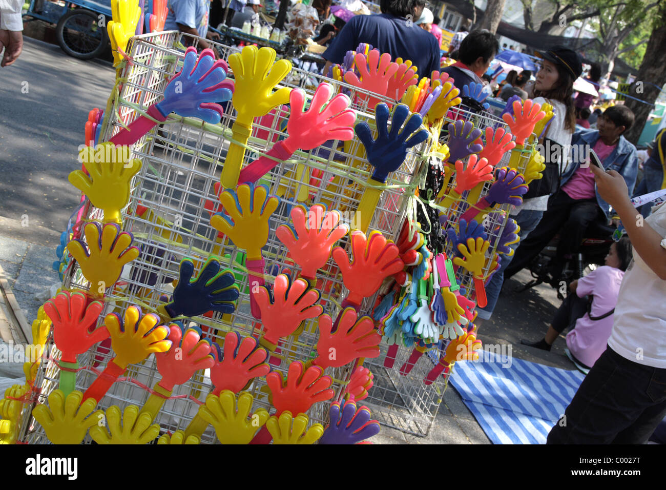 Hand-shaped clapper for sale in 'Yellow Shirts' PAD protester