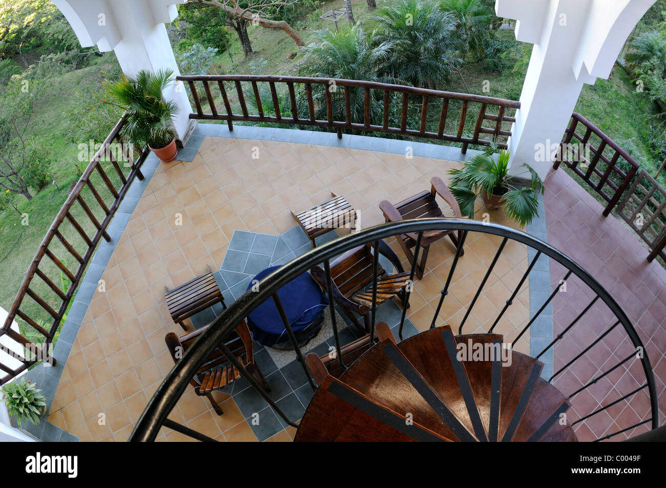 Open terrace and spiral staircase Stock Photo