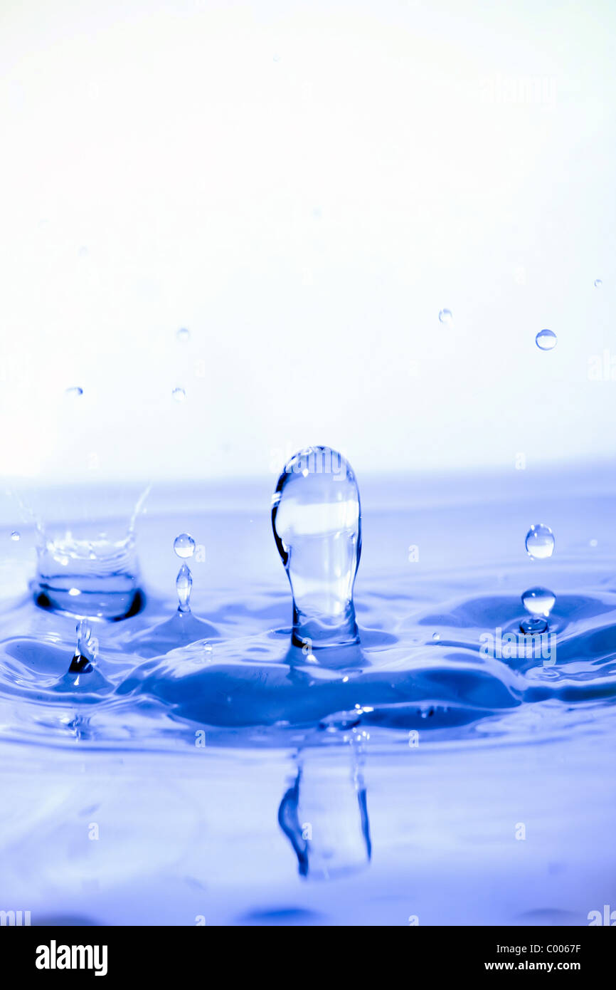 Blue splashing water droplets background. Shallow depth of field Stock ...