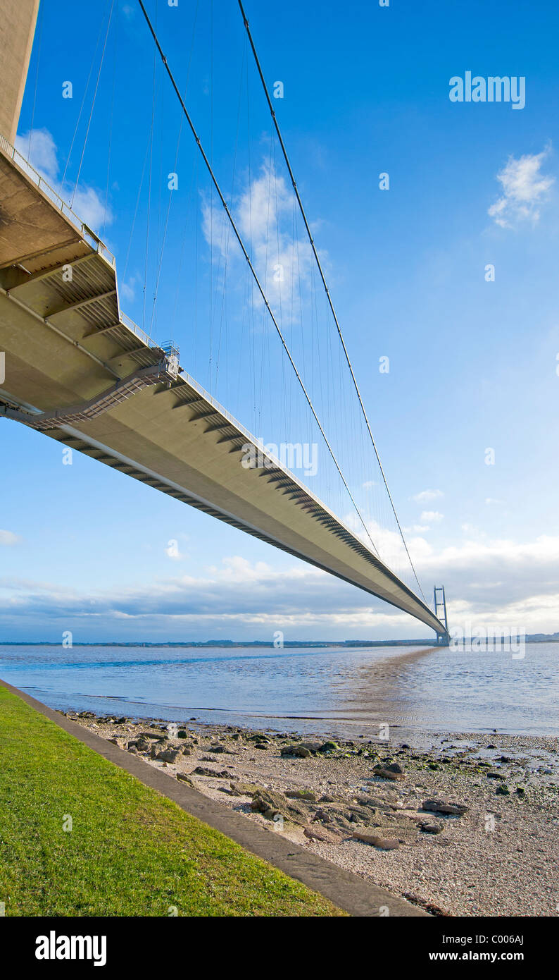 Large suspension bridge spanning a wide river Stock Photo - Alamy