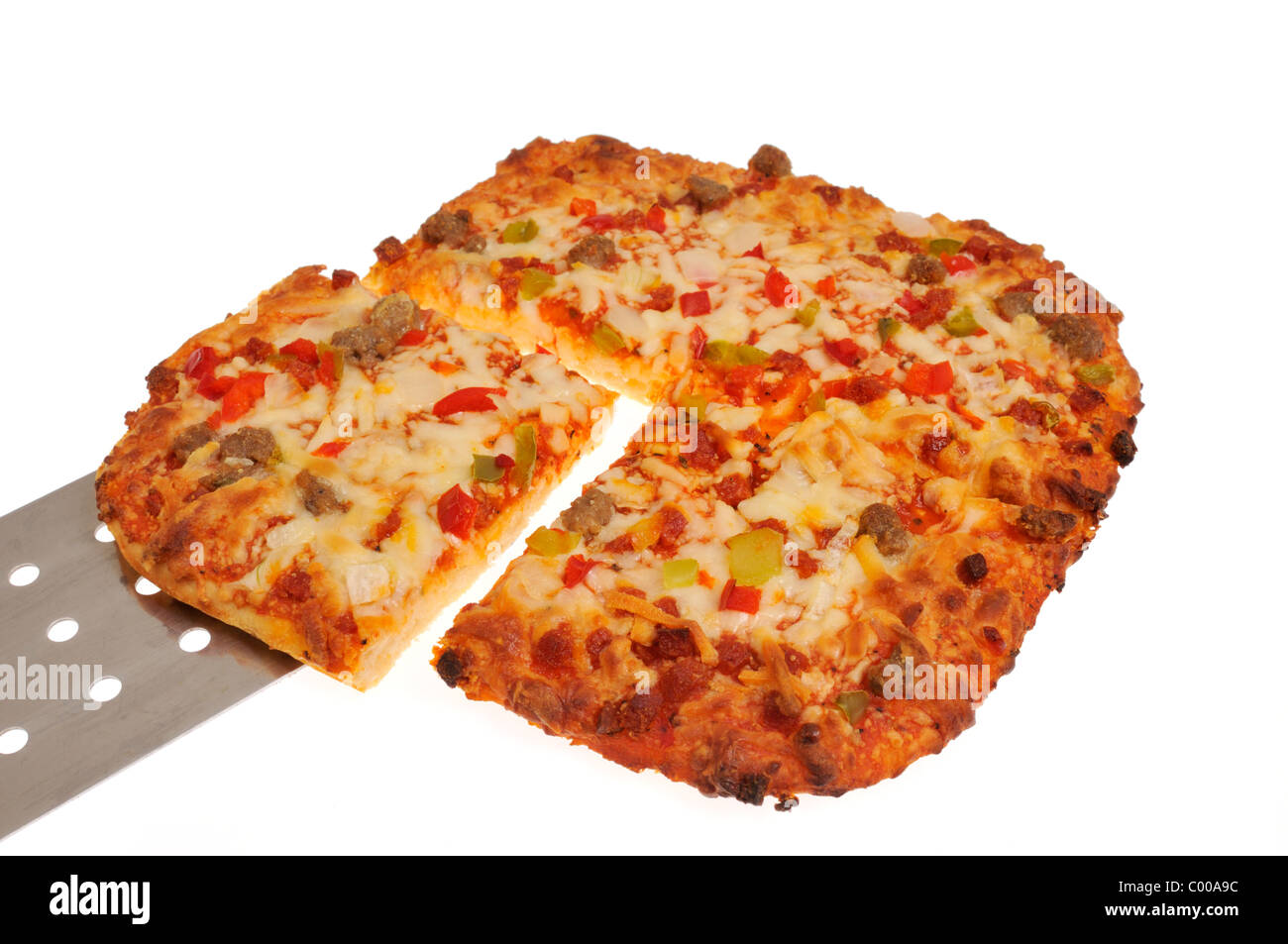 Slice of pizza on spatula with square pizza on white background cutout Stock Photo