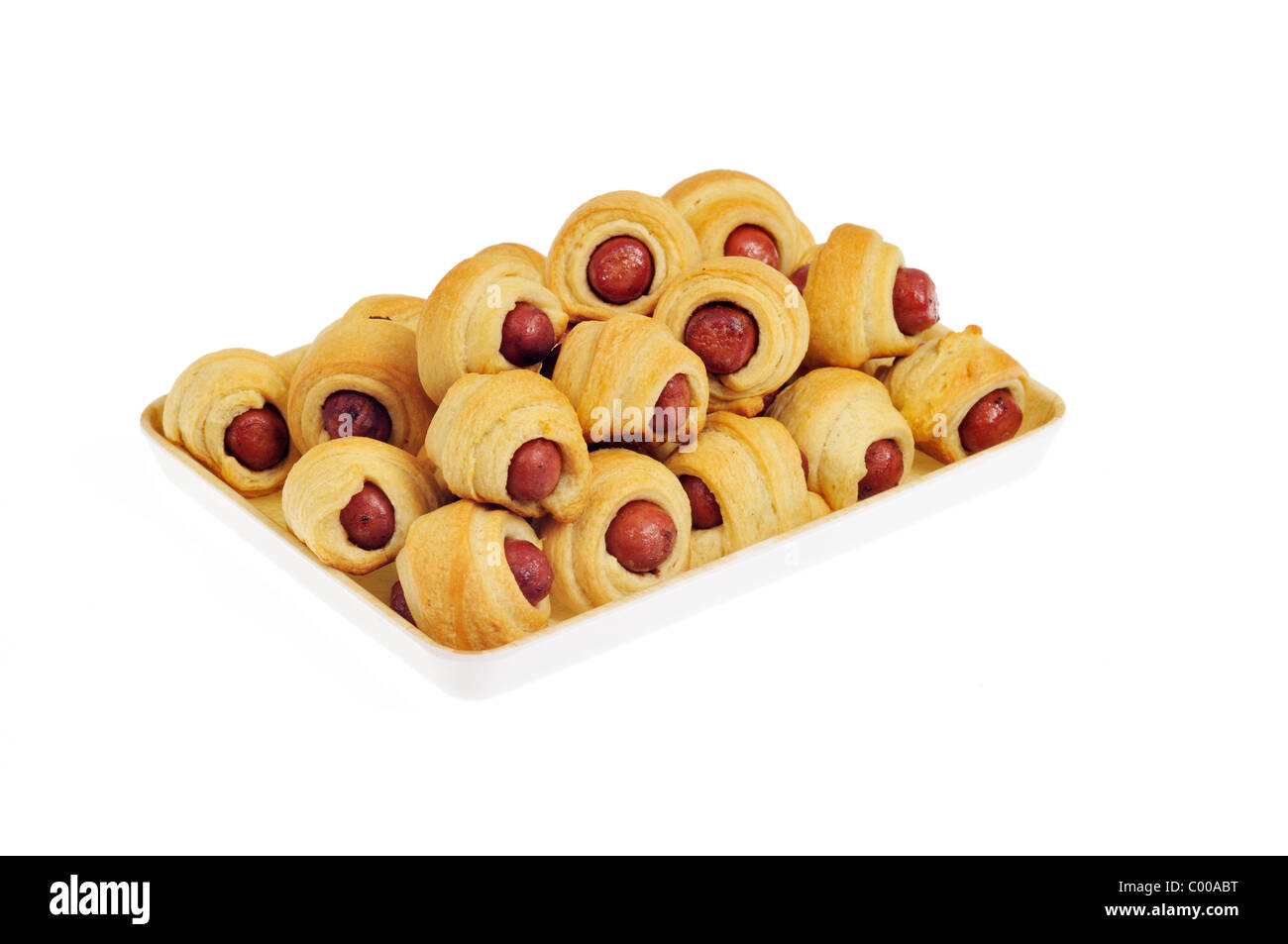 Pigs in a Blanket on serving tray on white background, cutout Stock Photo Alamy