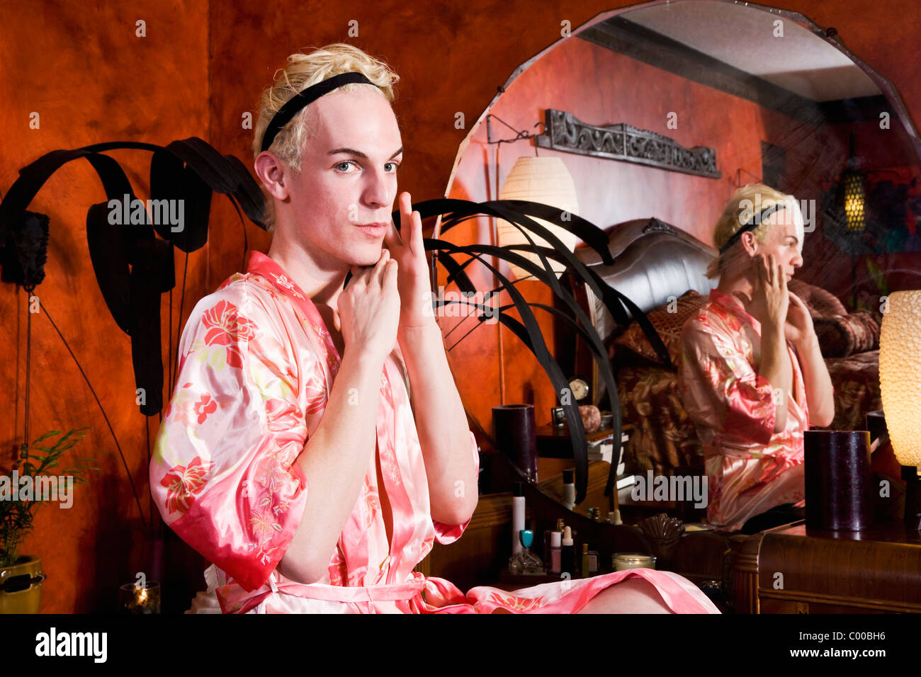 Drag queen sitting at vanity getting ready Stock Photo Alamy