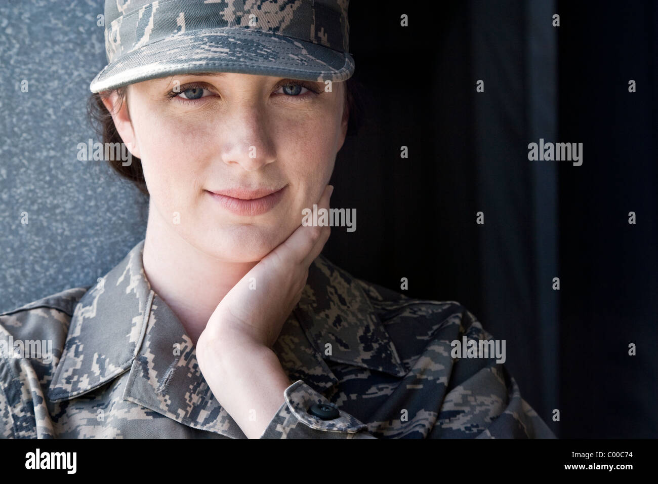 Headshot of young woman in army combat uniform Stock Photo - Alamy