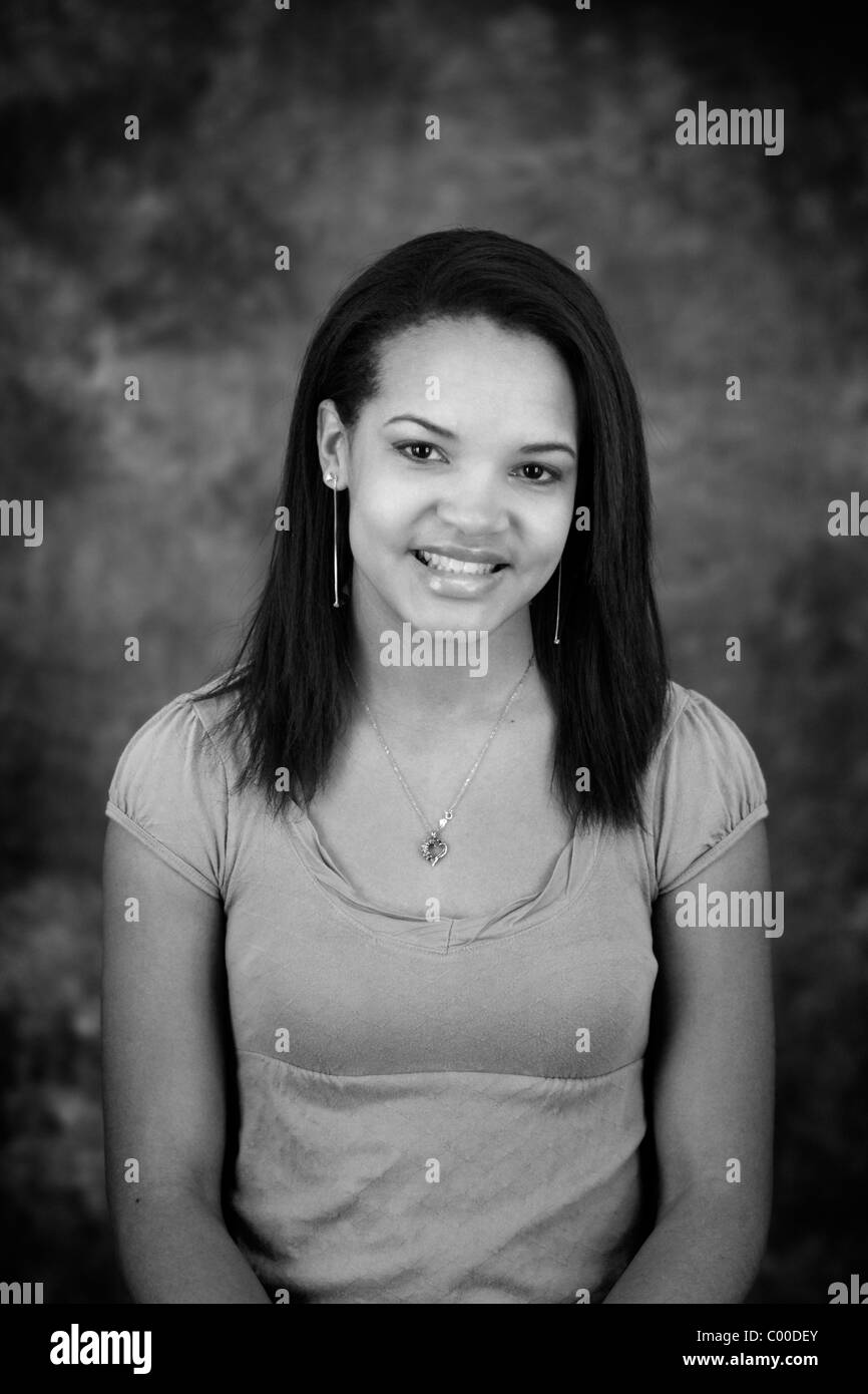 A teen African American girl with long straight hair Stock Photo - Alamy