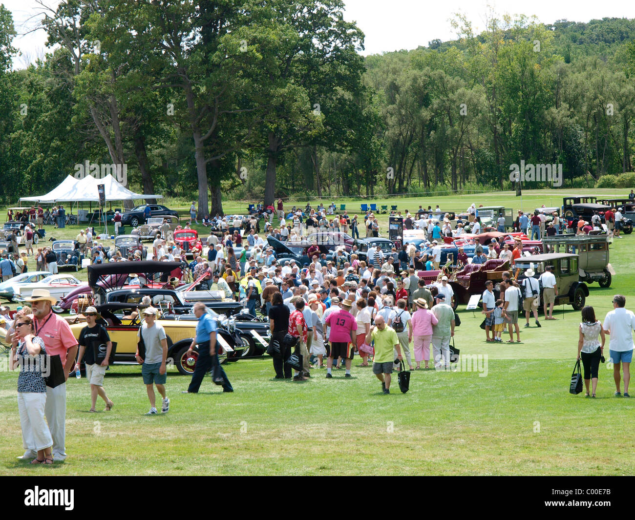 People looking at cars at Concours d'Elegance at Oakland University's Meadow Brook Hall in Rochester, Michigan Stock Photo