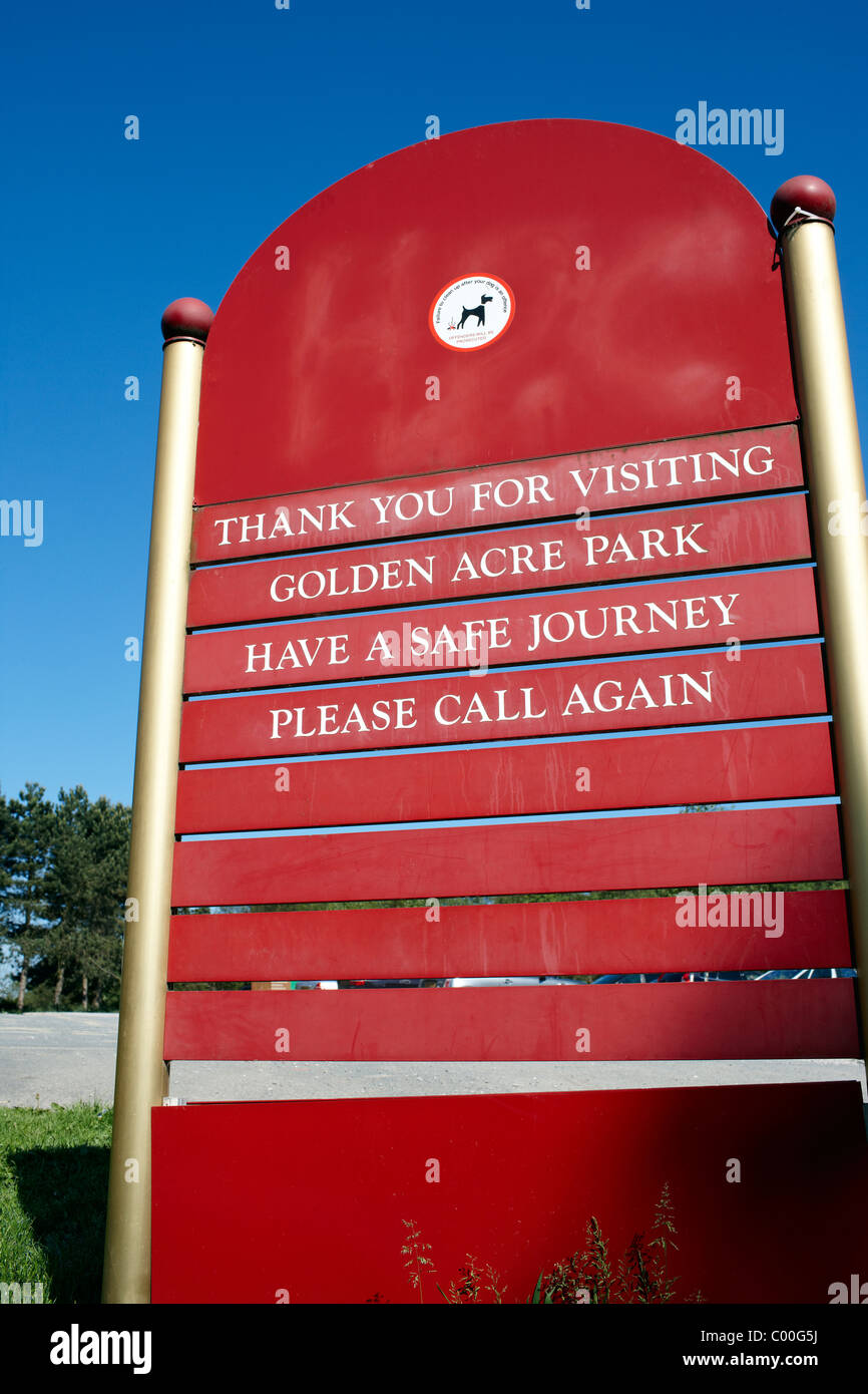 Golden Acre Park, Leeds. Sign at exit wishing visitors a safe journey. Stock Photo
