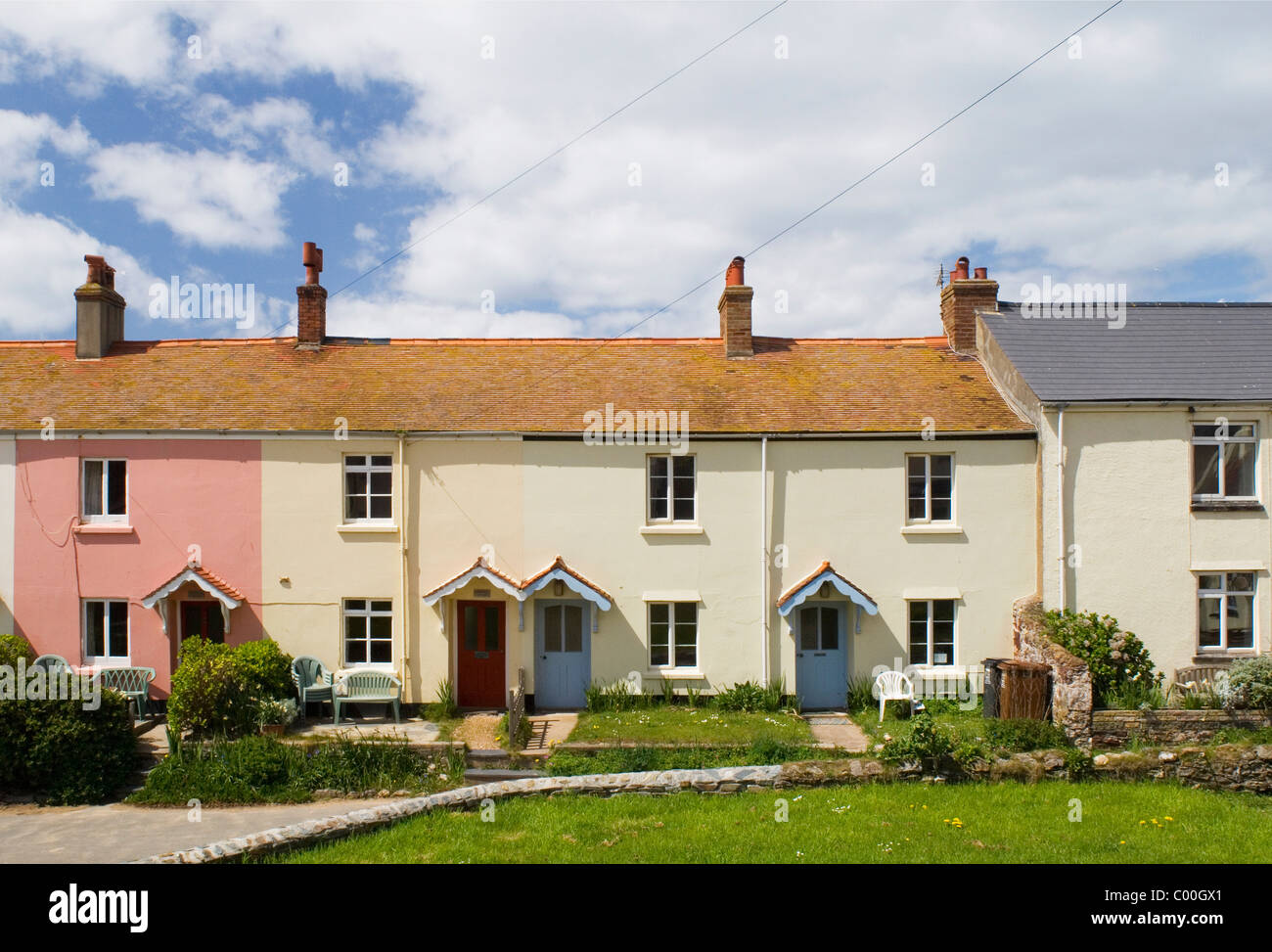 Colourful Holiday Cottages In Village At Hope Cove Stock Photo