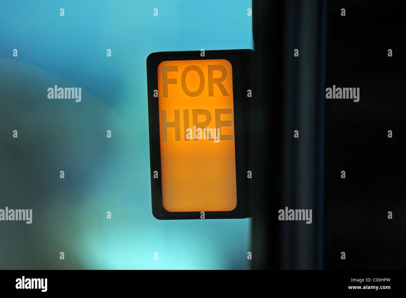 An illuminated Taxi for hire sign Stock Photo Alamy